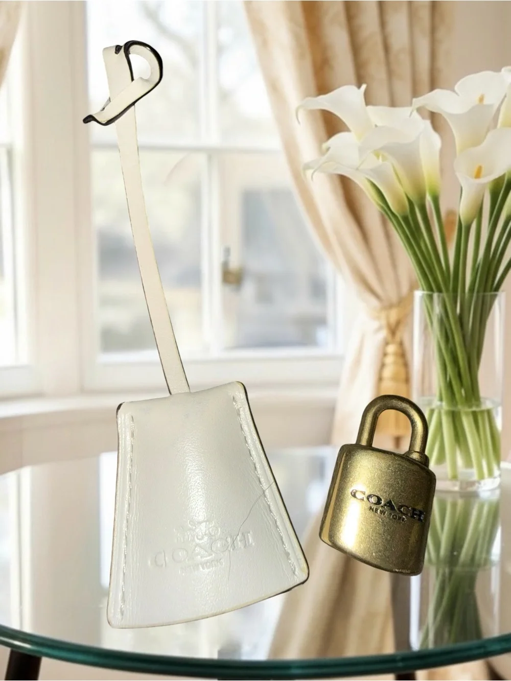 Authentic COACH Chalk White Leather Clochette & Antique Gold Padlock Charm Set